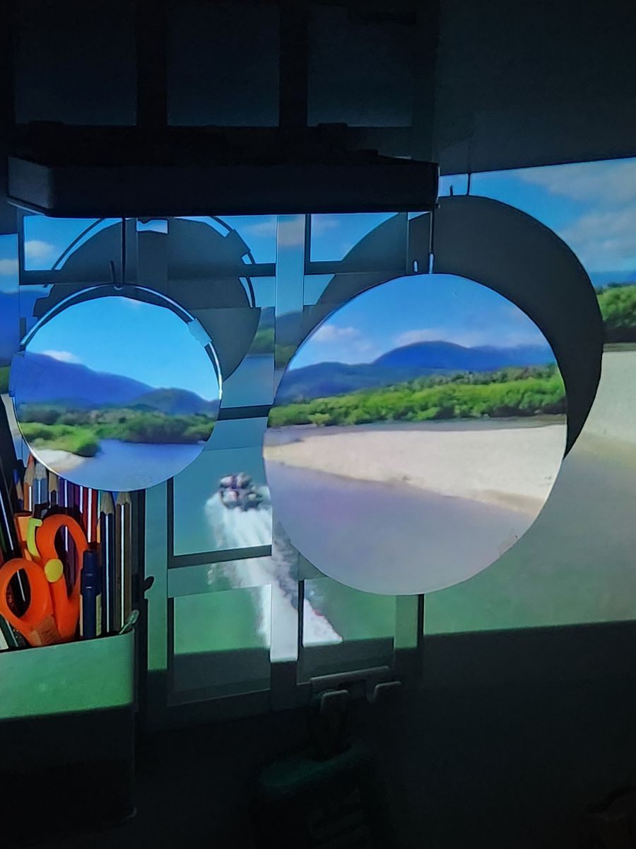 Hanging circles showing a river landscape