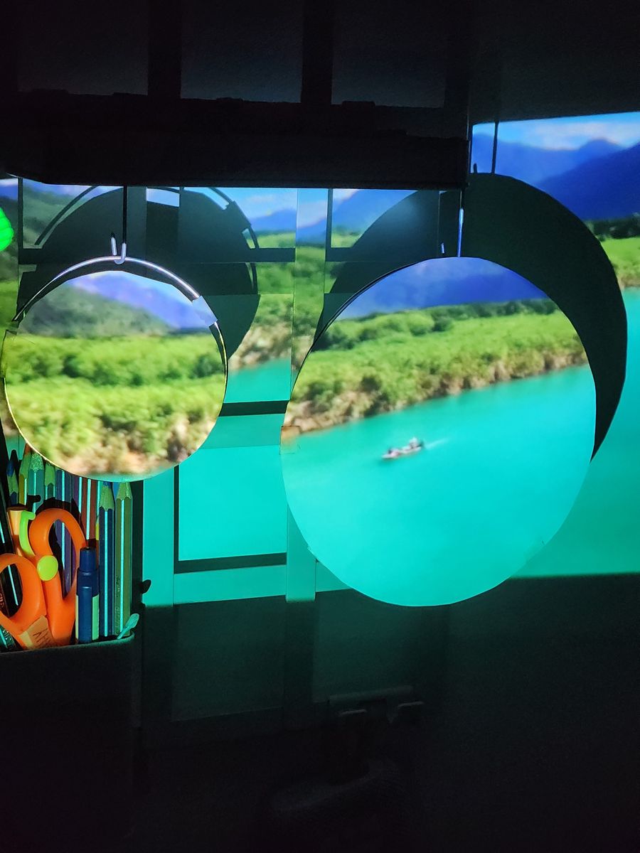 Hanging circles showing a turquoise river
