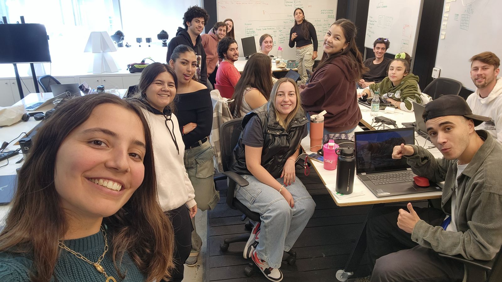 Selfie with part of the workshop group around a table